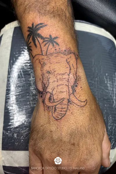 black-ink-tattoo-face-elephant-palm-tree