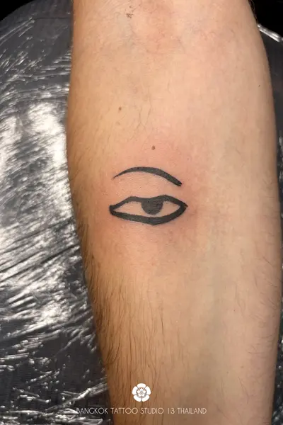 black-ink-tattoo-buddha-eyes-nepal-tibet