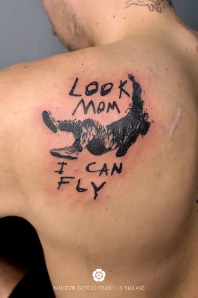 graphic-black-ink-tattoo-look-mom-i-can-fly