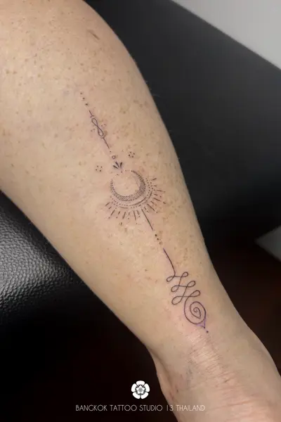 fine-line-tattoo-moon-and-sun
