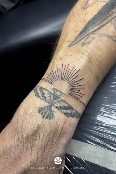 fine-line-sun-tattoo