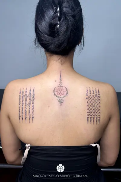 sak-yant-tattoo-full-back-women-5-rows-diamond-moon