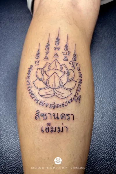 sak-yant-tattoo-lotus-custom-design-leg-men