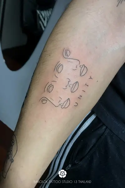 tattoo-weird-3-faces-unity